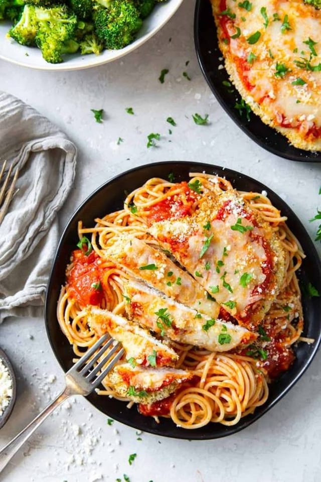 Spaghetti or Ziti with Sauce and Chicken Parmesan.